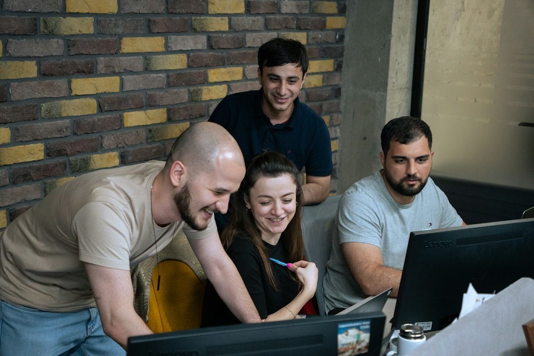 diverse group discussing code
