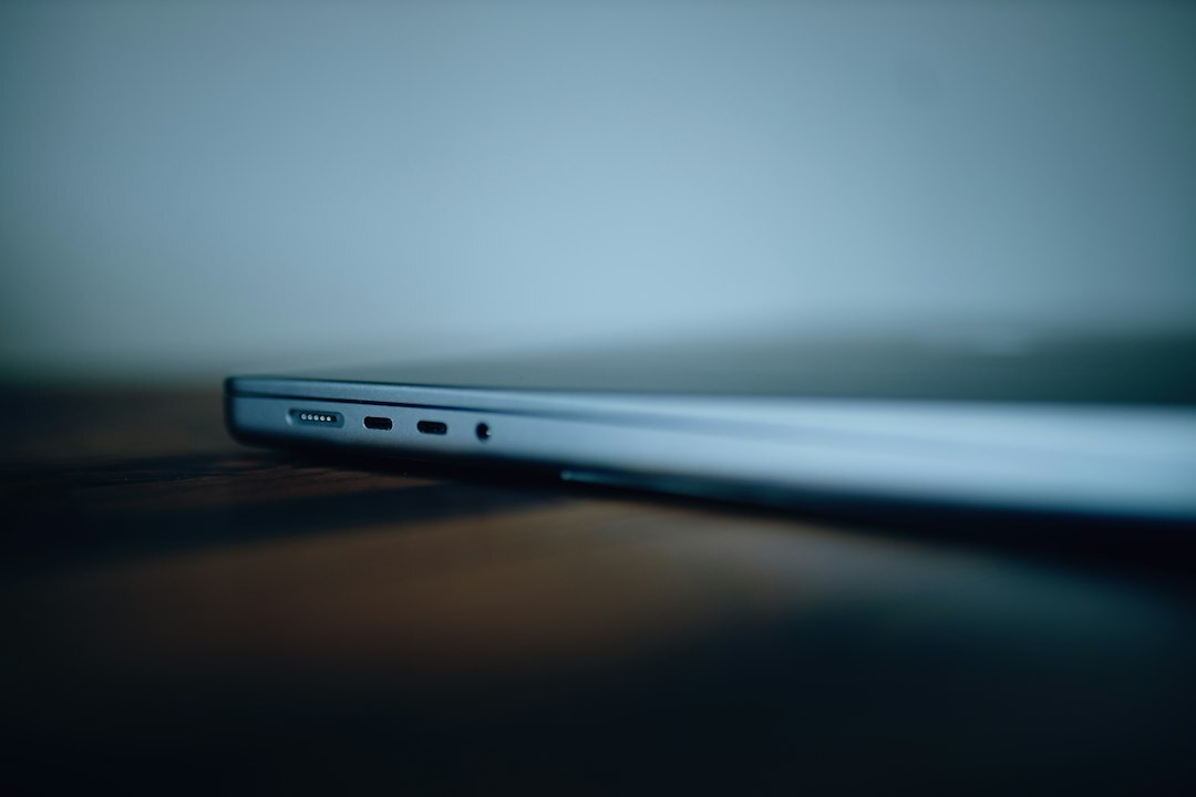 Close-up of laptop screen showing programming code
