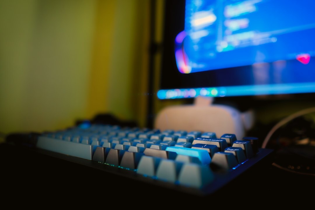 Blue programming code displayed on a computer monitor